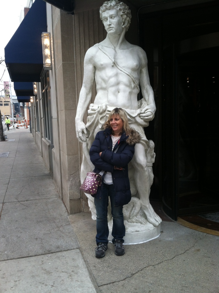 My sister in Greektown, three seconds after she was checking to see if the statue is anotomically correct.